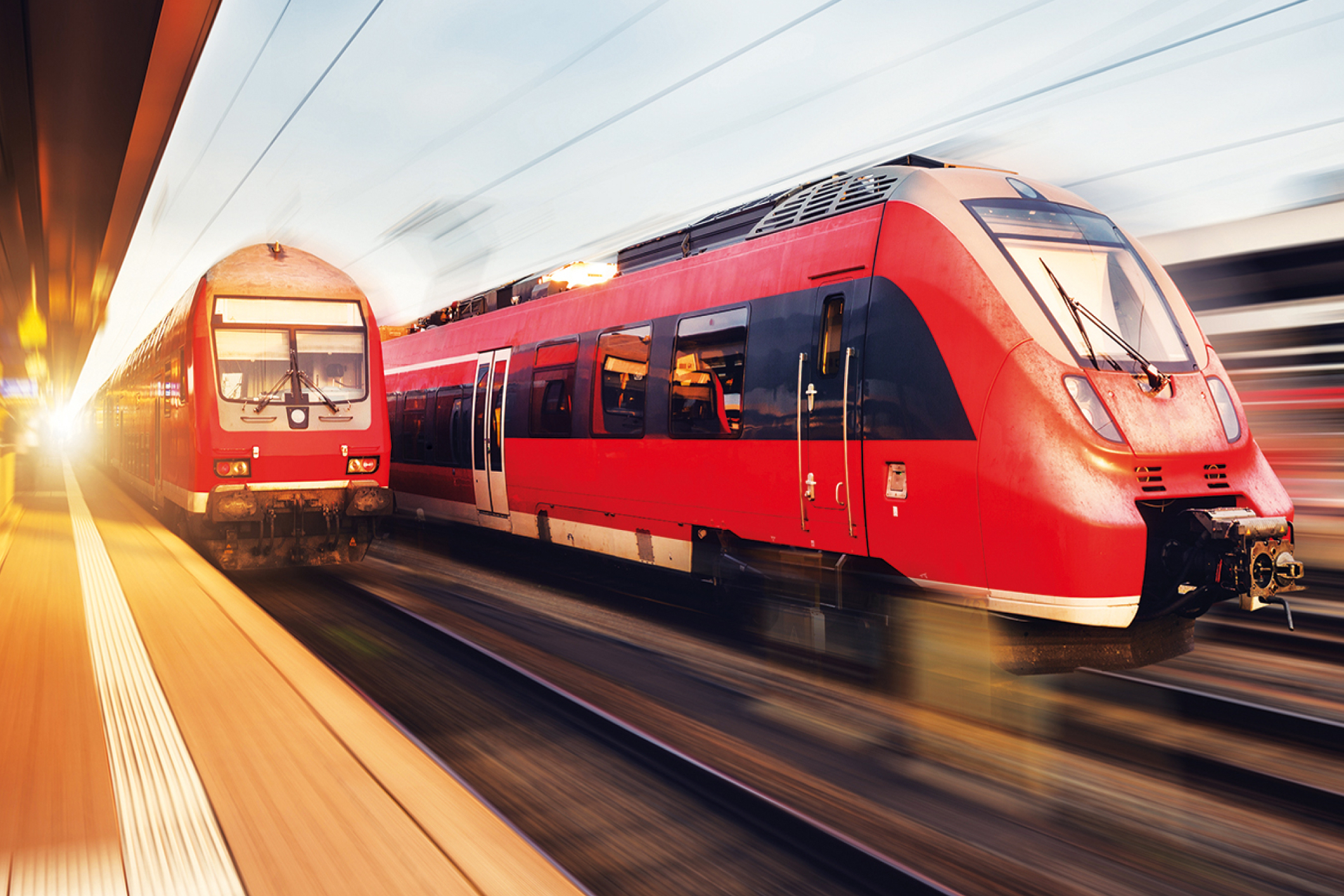 DB Regionalzüge mit Bewegungseffekt am Bahnhof