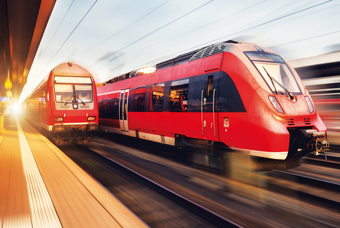 DB Regionalzüge mit Bewegungseffekt am Bahnhof